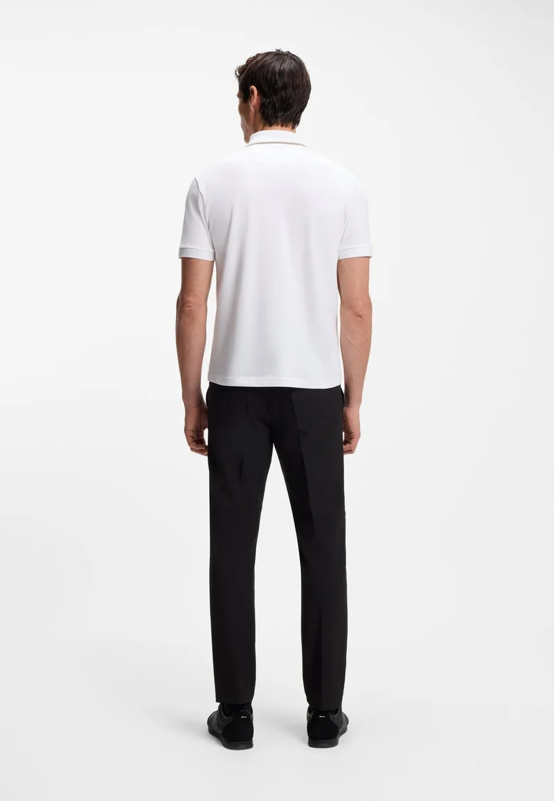 بوس قميص بولو قطن مطاطي بخطوط متباينة